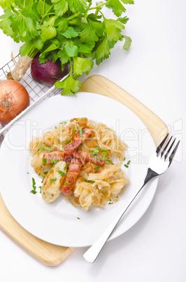 silesian potato dumplings with smoked pork and sauerkraut