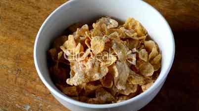 Corn flakes poured in a bowl
