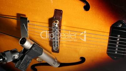 Jazz guitar and microphone.