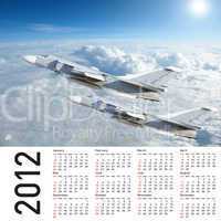 2012 Calendar with a military plane in the sky and clouds