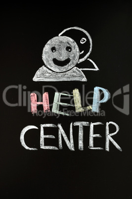 Help center with human figures drawn on blackboard