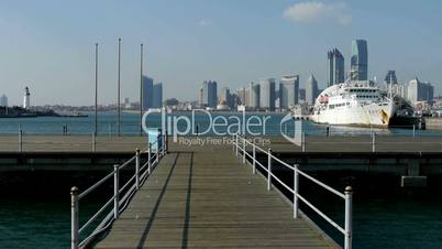 Vessel Parking on water at Pier of QingDao city Olympic Sailing Center,tsingtao,Tower,building,skyscraper,architecture,urban,modern.