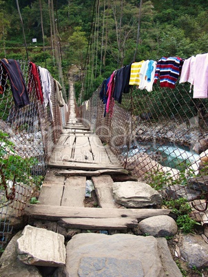 Old suspension bridge in Khudi, Nepal