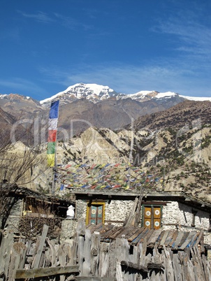 Traditional house, prayer flags, Nepal