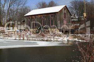 General view Old water mill in winter.