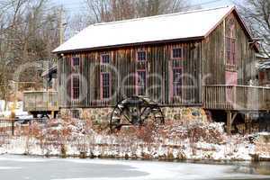 Old water mill in Waterloo, Ontario in snowy day.