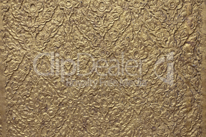 brown background with golden patterns