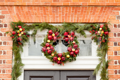 Traditional xmas wreath above front door