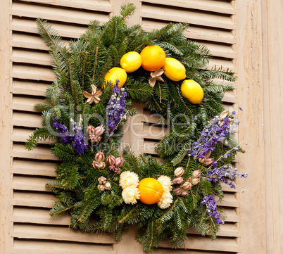 Traditional xmas wreath on front door