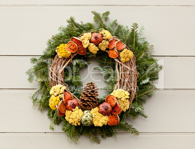 Traditional xmas wreath on front door