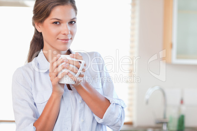 Woman holding a cup of tea