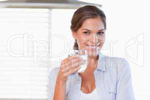 Woman holding a glass of water