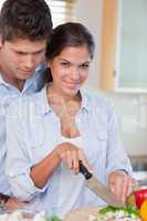 Portrait of a young couple cooking