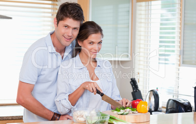 Married couple cooking