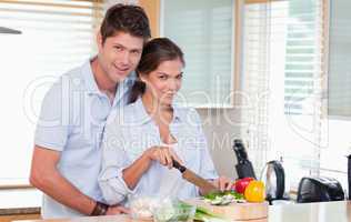 Married couple cooking