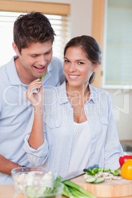 Portrait of a beautiful couple cooking