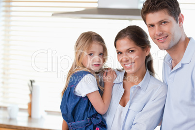 Young family posing