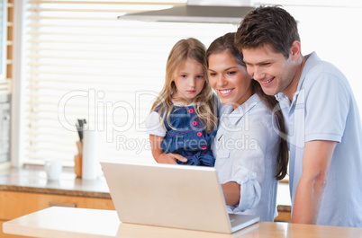 Family using a laptop