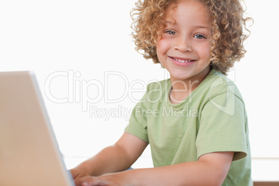 Boy using a notebook