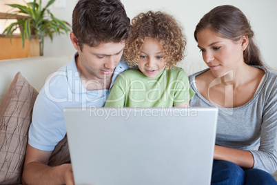 Family using a laptop