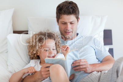 Father reading a story for child