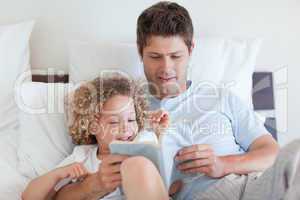 Father reading a story for child