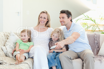 Happy family enjoying a movie