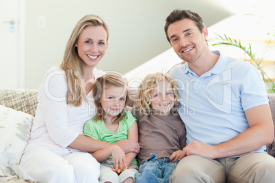 Happy family on the couch