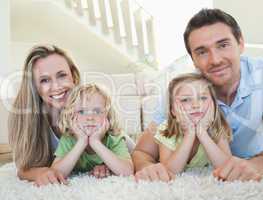 Family lying on the floor