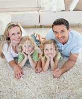 Happy family on the floor