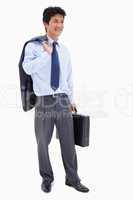 Portrait of a smiling businessman holding a briefcase and his ja