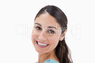 Close up of a young woman smiling at the camera