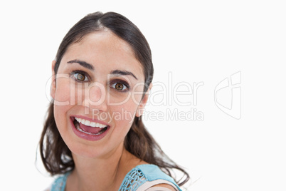 Close up of a cheerful woman smiling at the camera