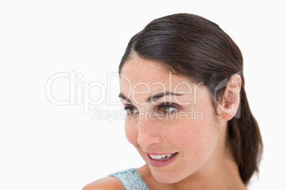 Close up of a beautiful woman looking away from the camera