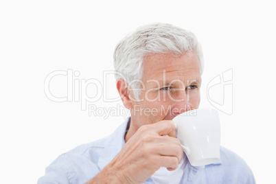 Mature man drinking coffee