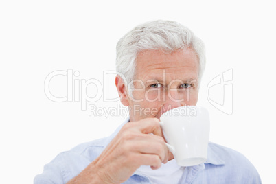 Mature man drinking tea