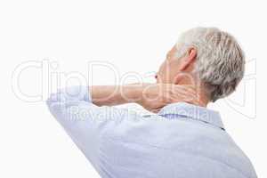 Mature man having a neck pain