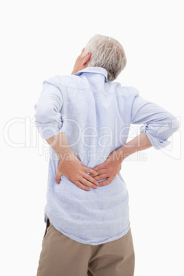 Portrait of a man having a back pain