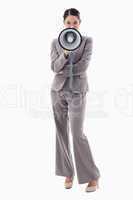 Portrait of a businesswoman using a megaphone