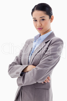 Portrait of a gorgeous businesswoman posing with the arms crosse