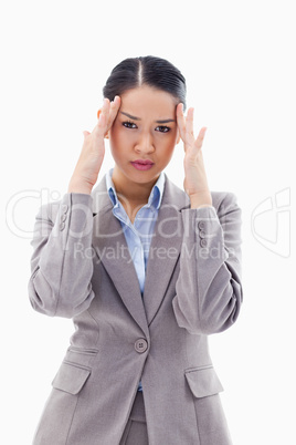 Portrait of a gorgeous businesswoman having a headache