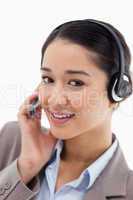 Portrait of a beautiful office worker posing with a headset