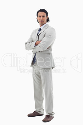 Portrait of a serious office worker posing with the arms crossed