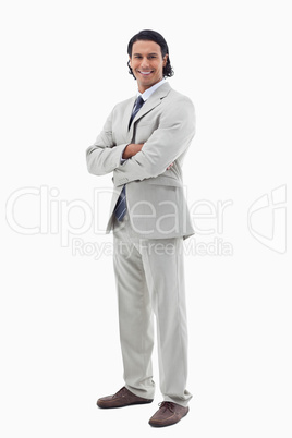 Portrait of a happy office worker posing with the arms crossed