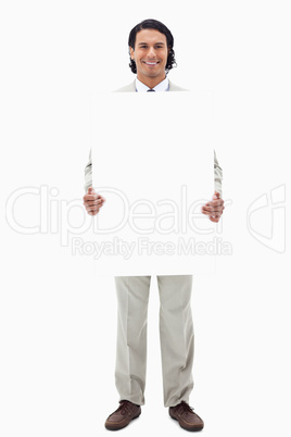 Businessman holding blank sign