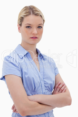 Woman standing with arms folded