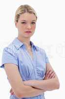 Woman standing with arms folded