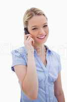 Smiling woman using cellphone