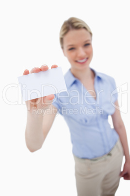 Blank business card being held by smiling woman