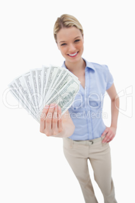 Money being held by woman